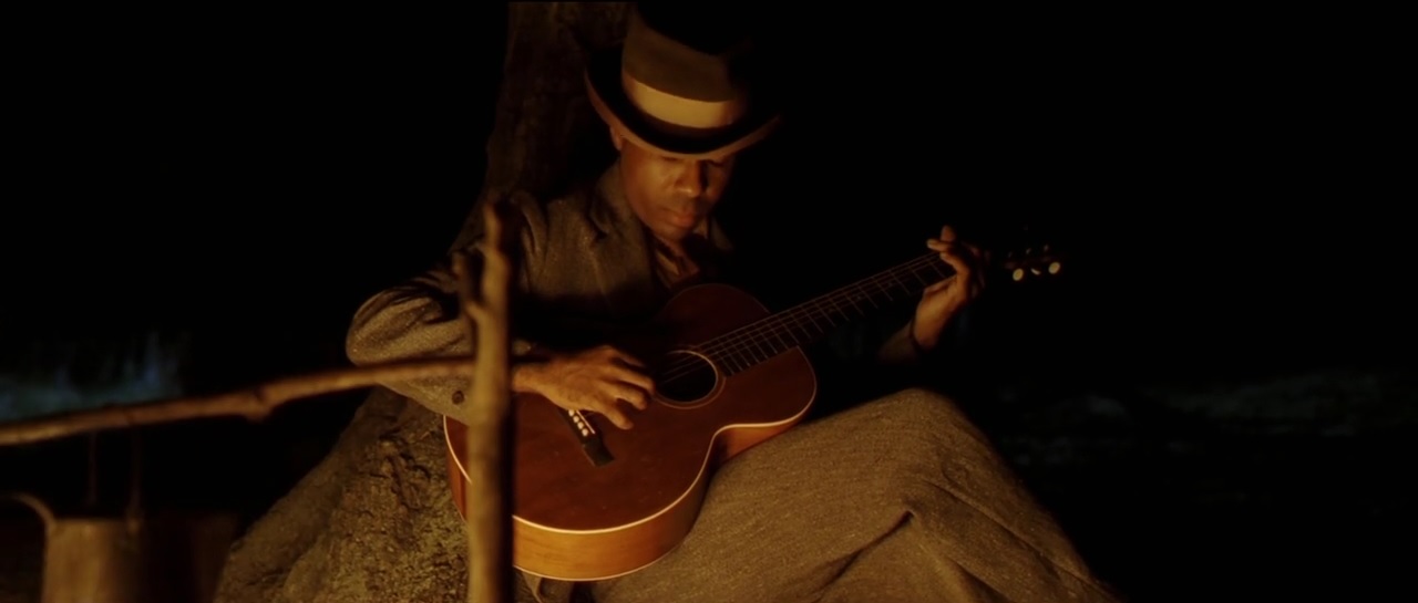 Tommy Johnson (Chris Thomas King) - O'Brother