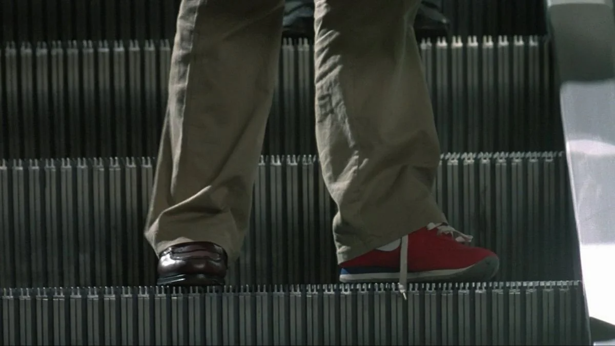 L'Homme à la chaussure rouge
